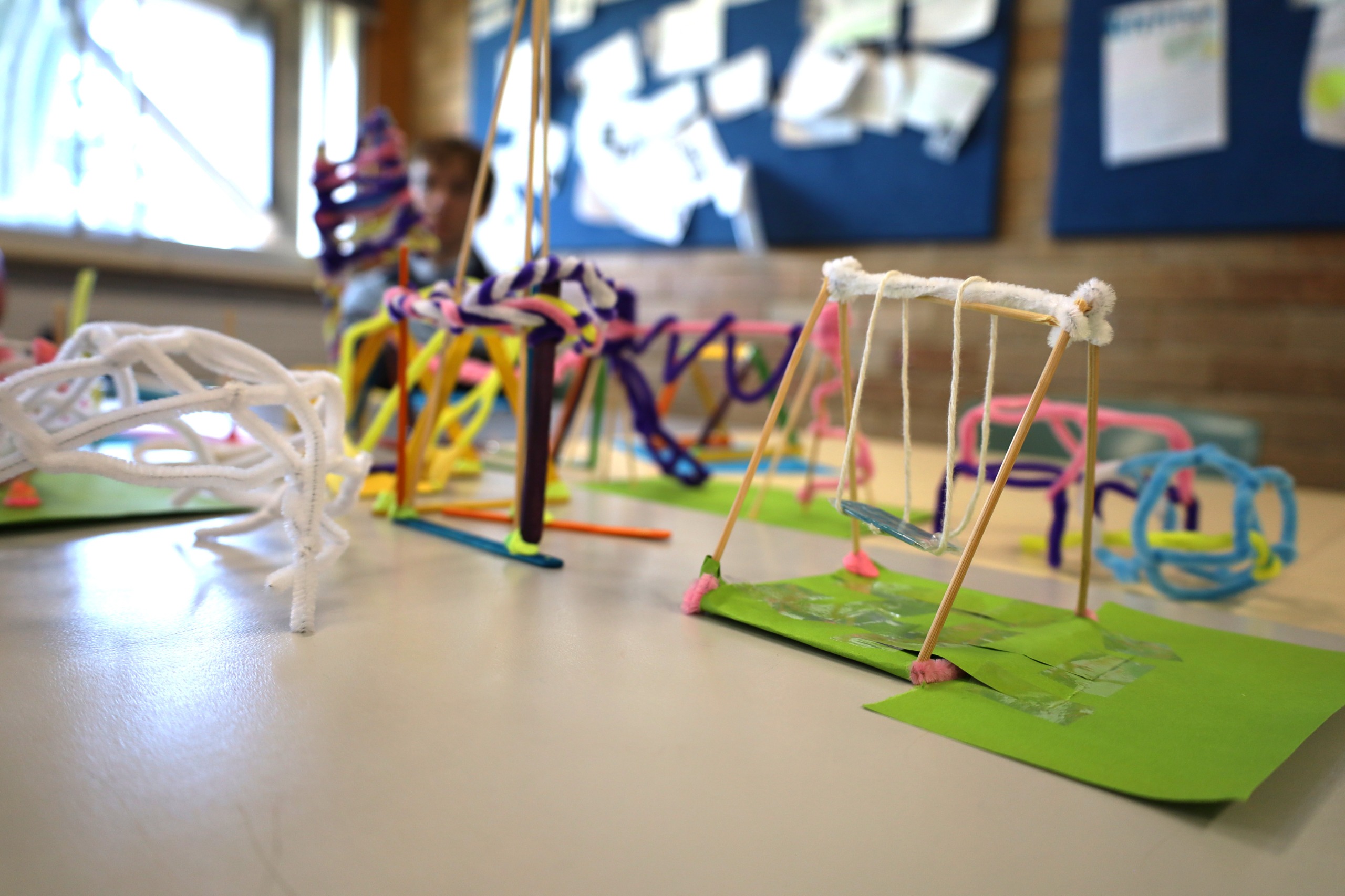 Models made of pipe cleaners, paper, tape and string
