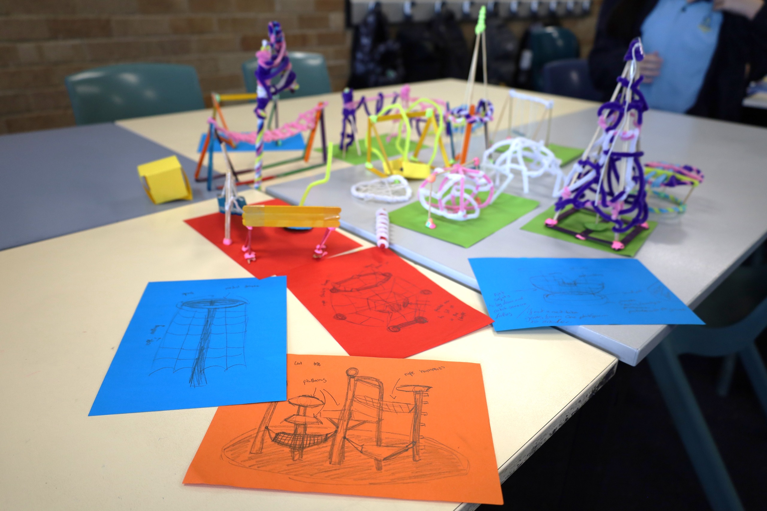 Models made of pipe cleaners, paper, tape and string